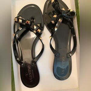 Valentino Garavani Black Jelly Bow Sandals with Gold Studs